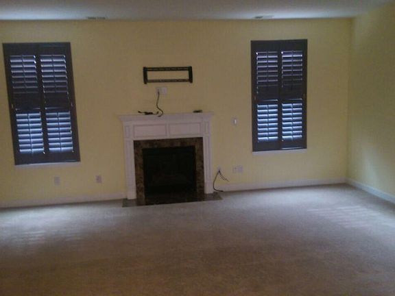 Large open family room with Plantation Shutters
