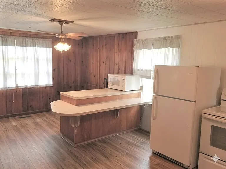 Refrigerator, electric smooth top stove/oven, counter microwave, dishwasher. Expanded kitchen, cook's delight!
