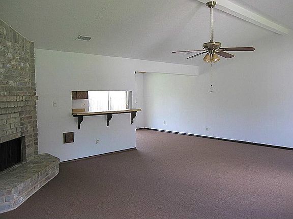 Huge living room, dining area and breakfast bar.  Brand new carpet and paint throughout!