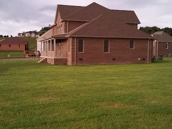 Side view of home and yard