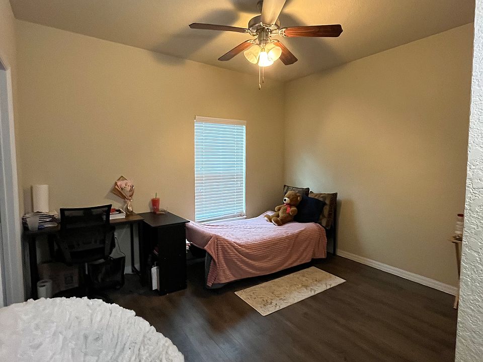 Spacious and bright private bedroom located on the 2nd floor, featuring a large window for natural light, neutral-toned walls. The room includes a generous closet for storage and easily fits a bed, desk, and dresser