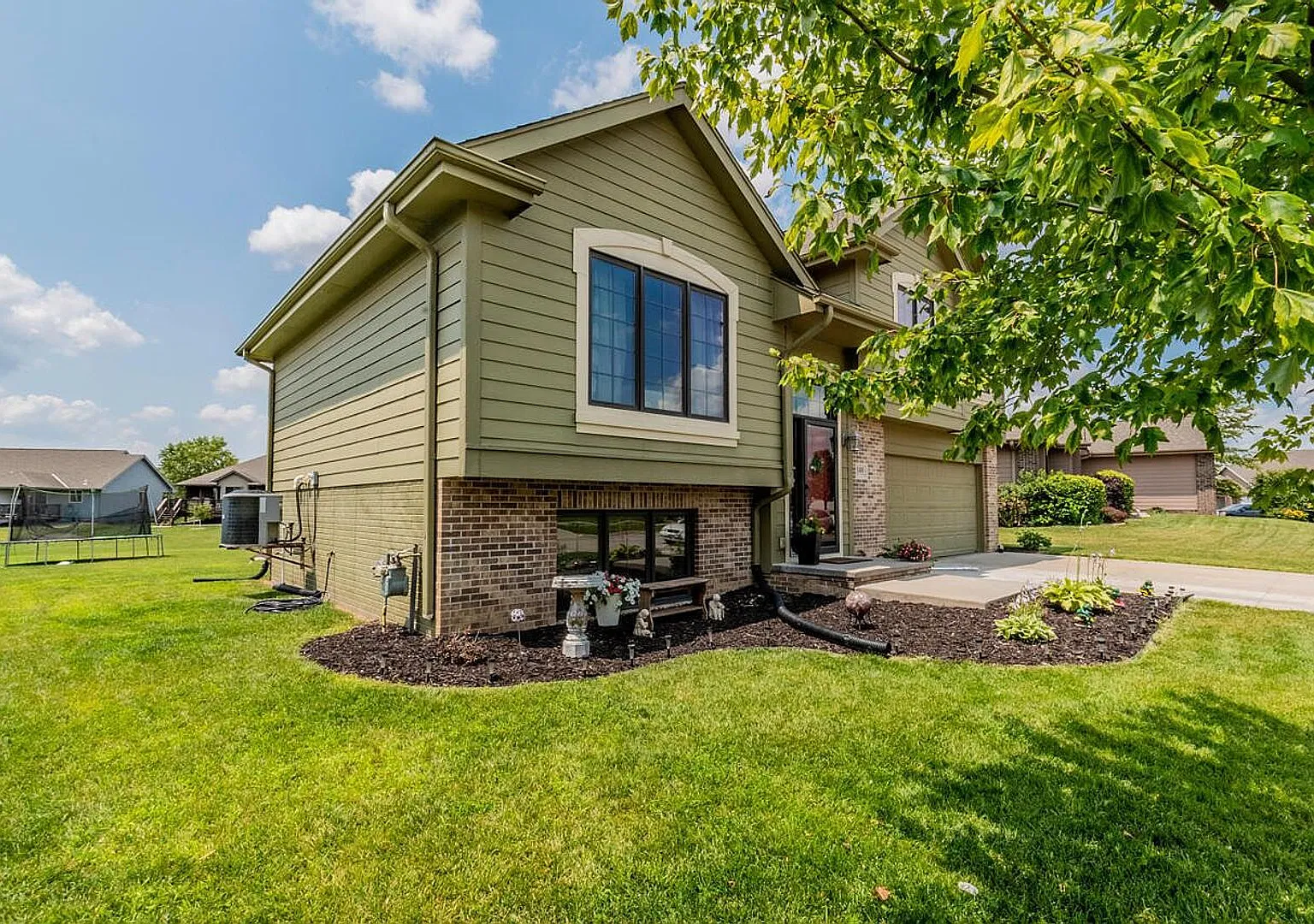 **Spacious 4-Bedroom Home in Lewis Central School District 2-Car Garage & Large Yard** — Photo 3