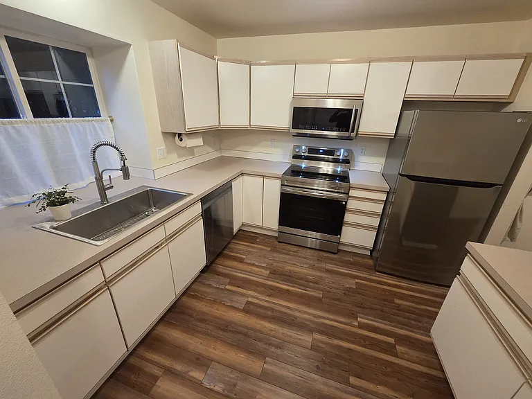 Kitchen. New dishwasher and stove/microwave. Fridge installed 2024