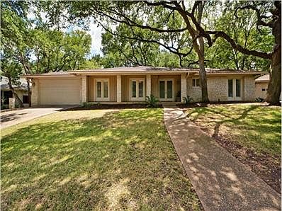 Limestone Ranch Style home on quiet street with ample shade