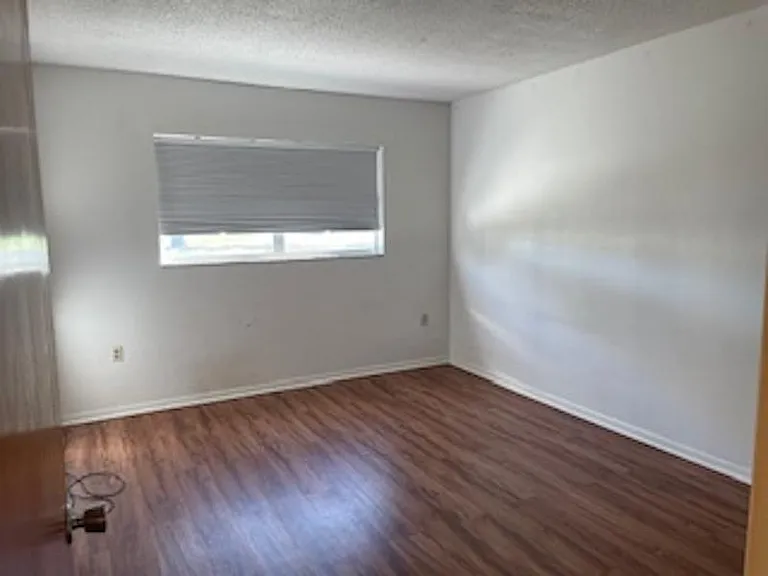 Spacious 2nd bedroom. Easy to care for floors.