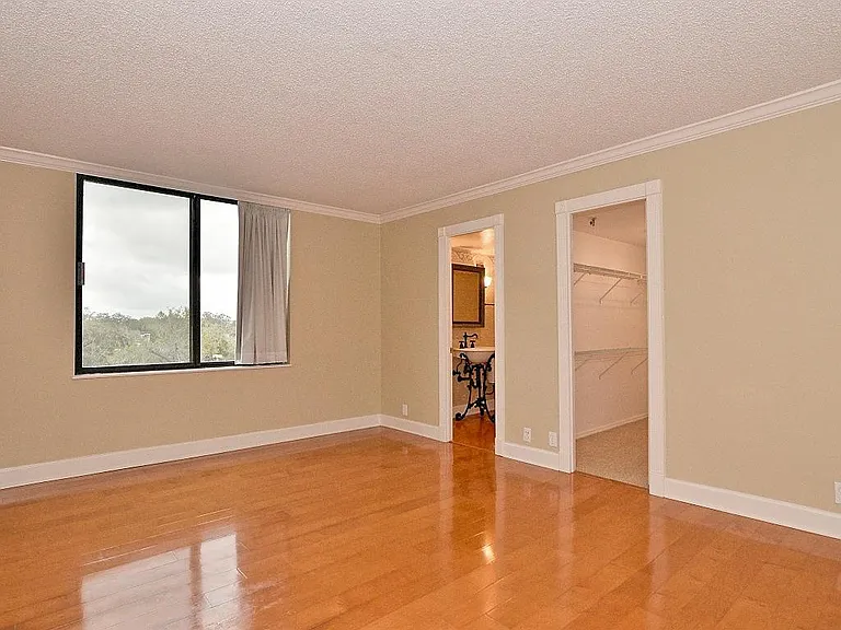 Master bedroom looking at bath and walk in closet