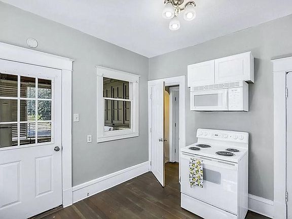 Kitchen with laundry room out the door to the left