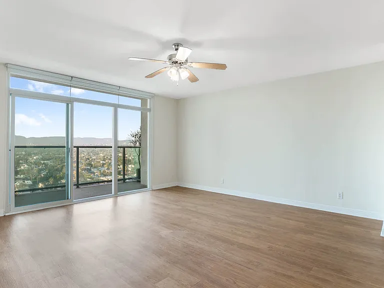 Living Room with Hard Surface Flooring and Balcony