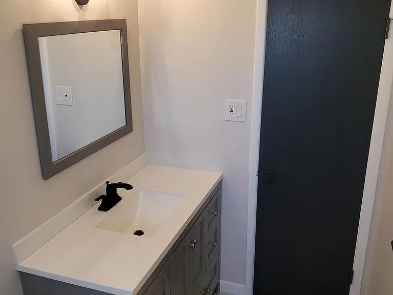 Bathroom with large vanity.