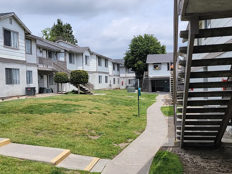 Walkways between buildings at Grand Oaks Apartments in Lake Elsinore, California.