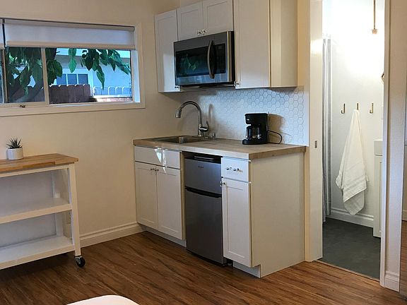 Mini Kitchen: not pictured but included is an induction burner and toaster oven