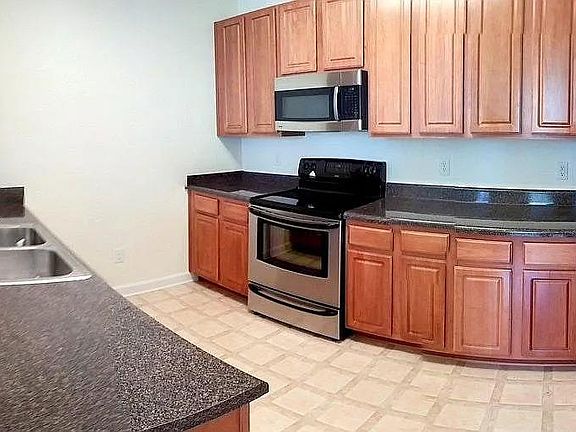 Kitchen - Stainless Steel Dishwasher, Microwave, Oven and Refrigerator
