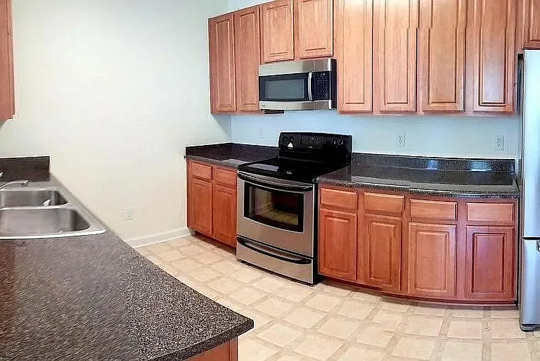 Kitchen - Stainless Steel Dishwasher, Microwave, Oven and Refrigerator