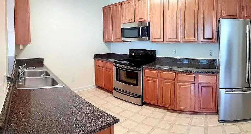 Kitchen - Stainless Steel Dishwasher, Microwave, Oven and Refrigerator