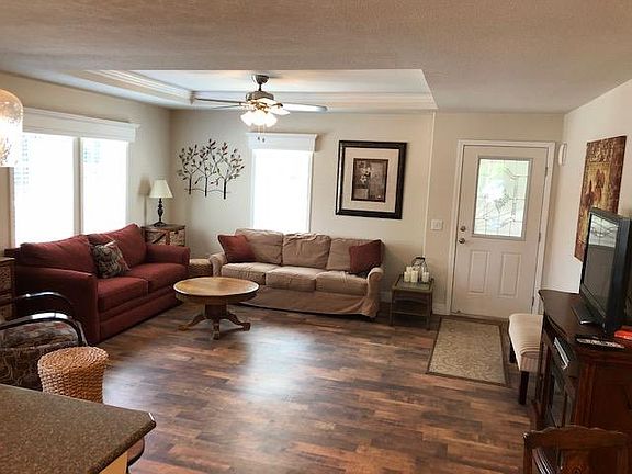 Open living space - Livingroom and front entry.