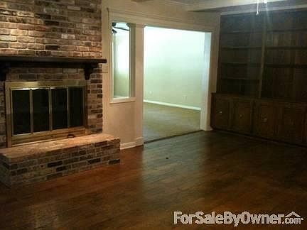 Den with view of Media/Playroom