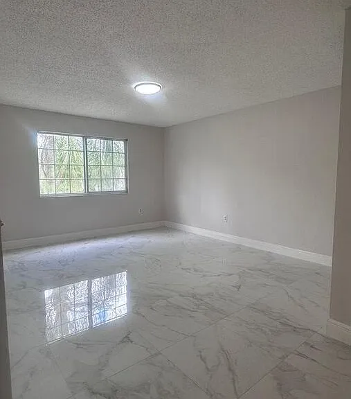 5011 Wiles Rd #3-207 — Photo 1