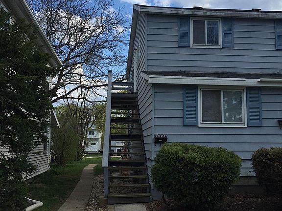 Stairs to access the upstairs apartment. 