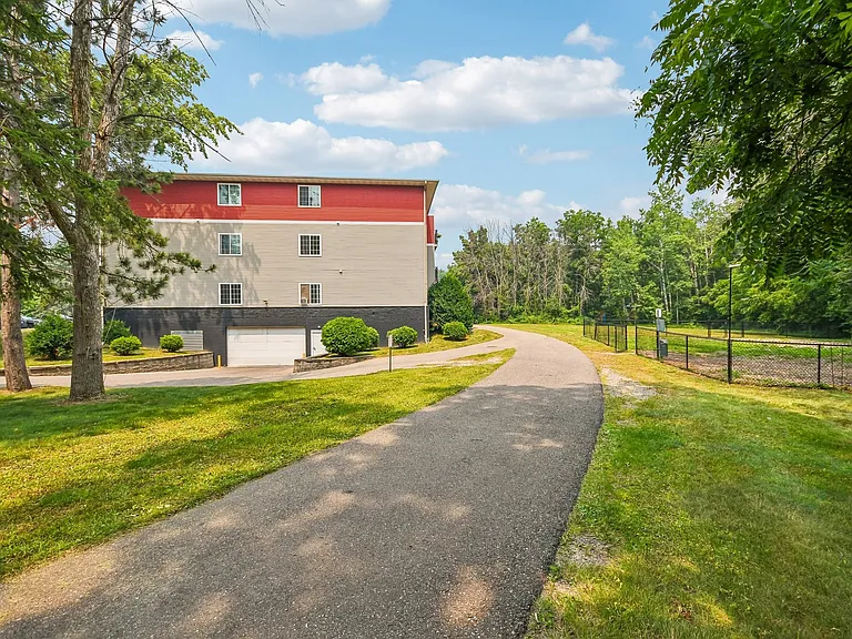 Embrace a serene lifestyle at Mill Pond Apartments, where lush greenery meets modern living. Enjoy a peaceful pathway that invites you to explore beautifully maintained grounds. Ready to make this your new home? Inquire today!