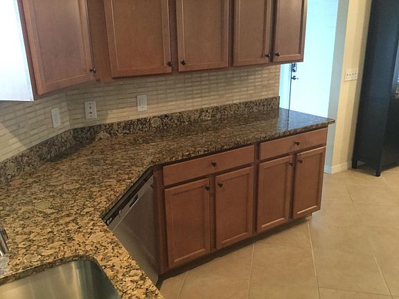 Lots of counter space and roll-out drawers. Under cabinet lightening