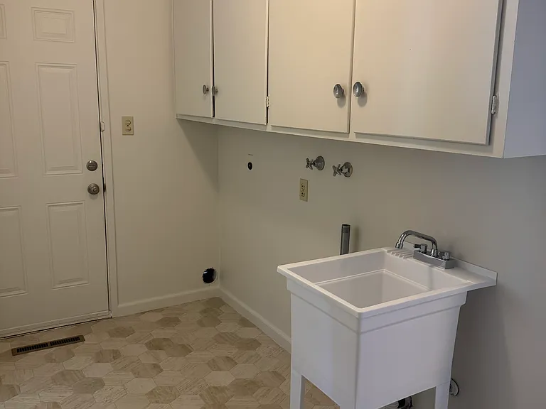 Utility sink with washer and dryer hook-ups