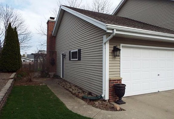 Sidewalk around to backyard