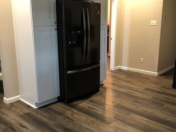 Refrigerator included surrounded by pantry space