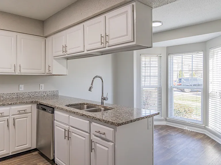 Kitchen with granite counters and modern cabinetry