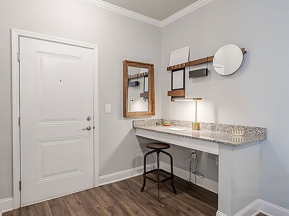 Transform your entryway with this chic and functional workspace design.