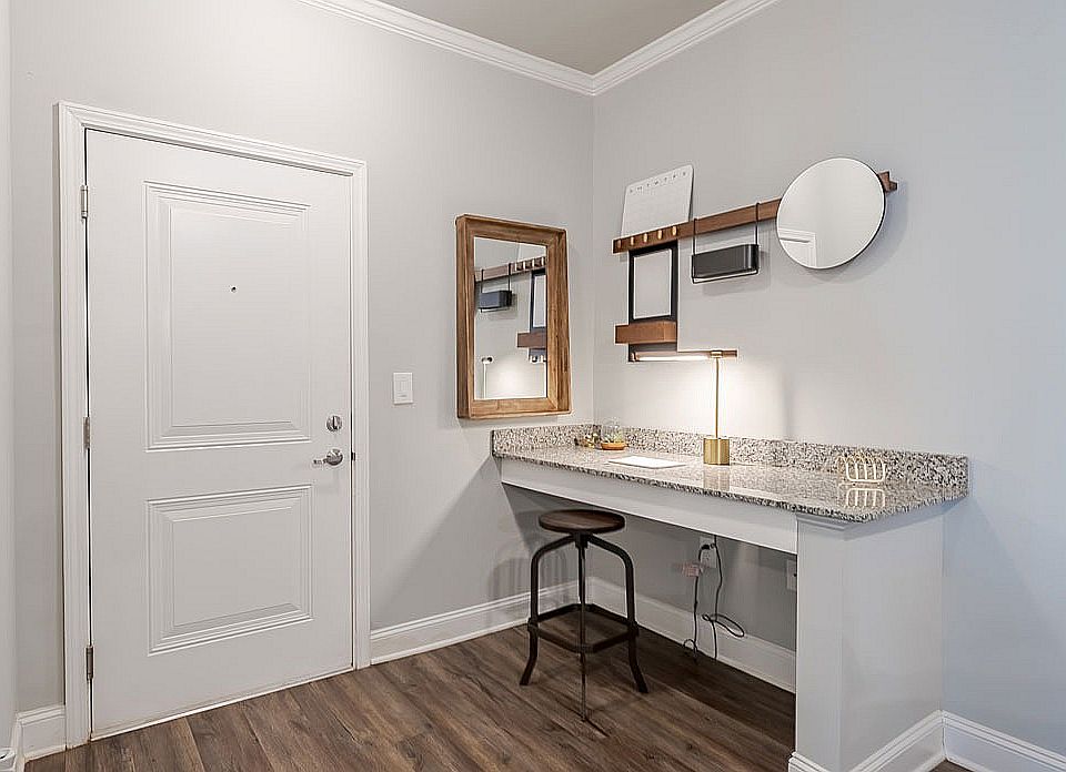 Transform your entryway with this chic and functional workspace design.