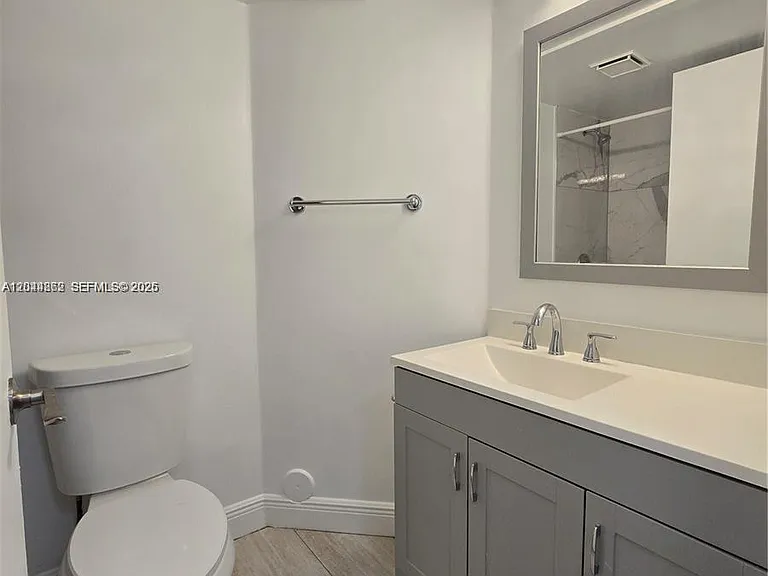 2890 N Oakland Forest Dr #102 — Photo 13
