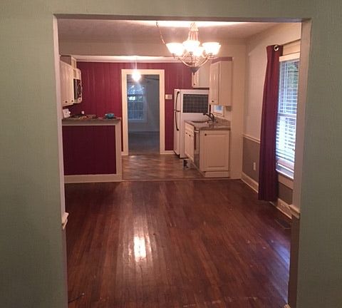 From foyer through dining room and into kitchen and living r