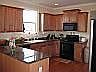 Kitchen with great lighting and granite countertops!