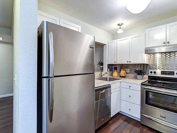 Kitchen updated with stainless appliances.