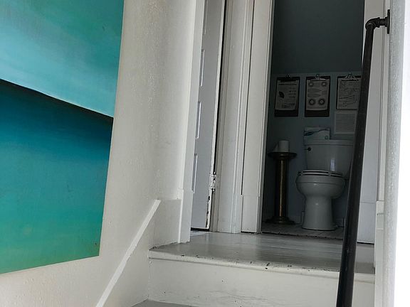 Standing on Landing looking into upstairs powder room