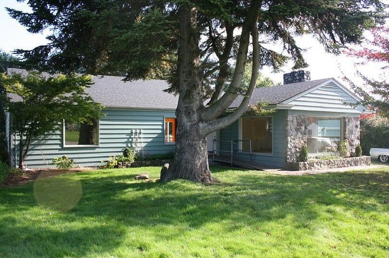 Nestled among the trees on a large lot