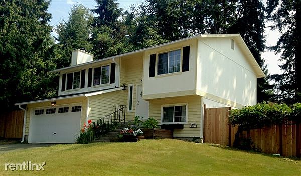 Front yard; house exterior is freshly painted