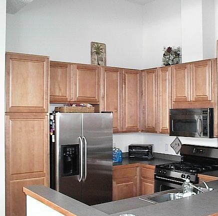 42" Maple cabinets, wood-trimmed counters, stainless-steel appliances...