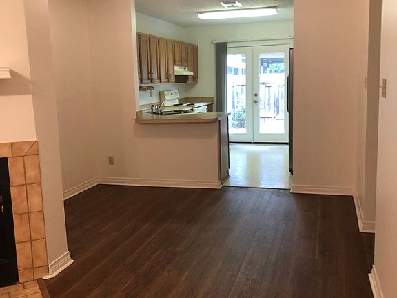 Separate cozy dining area then bright open kitchen.