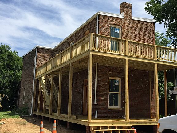 Large outdoor deck and parking