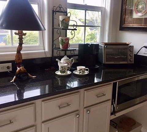 Kitchen has full size sink,lge microwave,Hot Spot, lge.toaster oven and medium size fridge with freezer space.