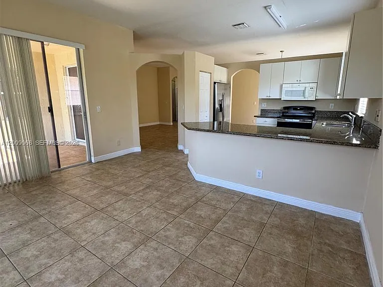 12860 SW 51st St — Photo 12