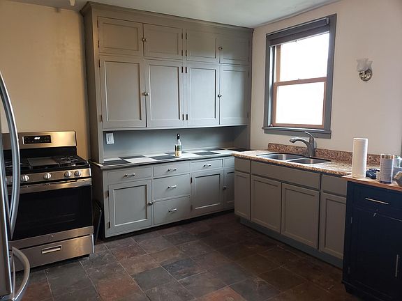 Stainless steel appliances; gas range.
