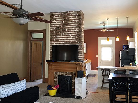 1036 living-room. Open floor plan. Cypress trim, closet doors, baseboards and mantles.