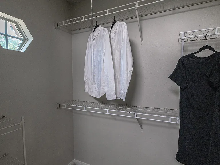 Live the dream with the master suite's walk-in closet, a treasure trove of space and organized elegance.