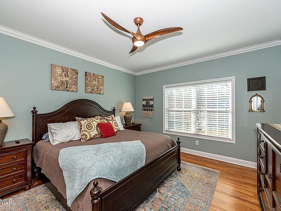 Master Bedroom on main level with walk-in closet and en-suite bathroom