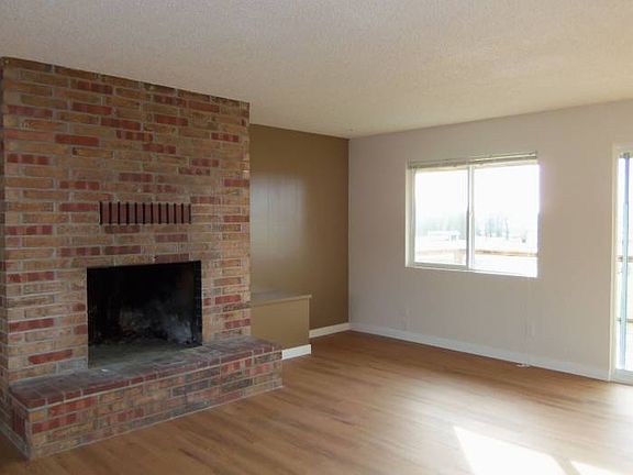 living room with fireplac