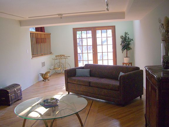 Den with Fireplace and french doors