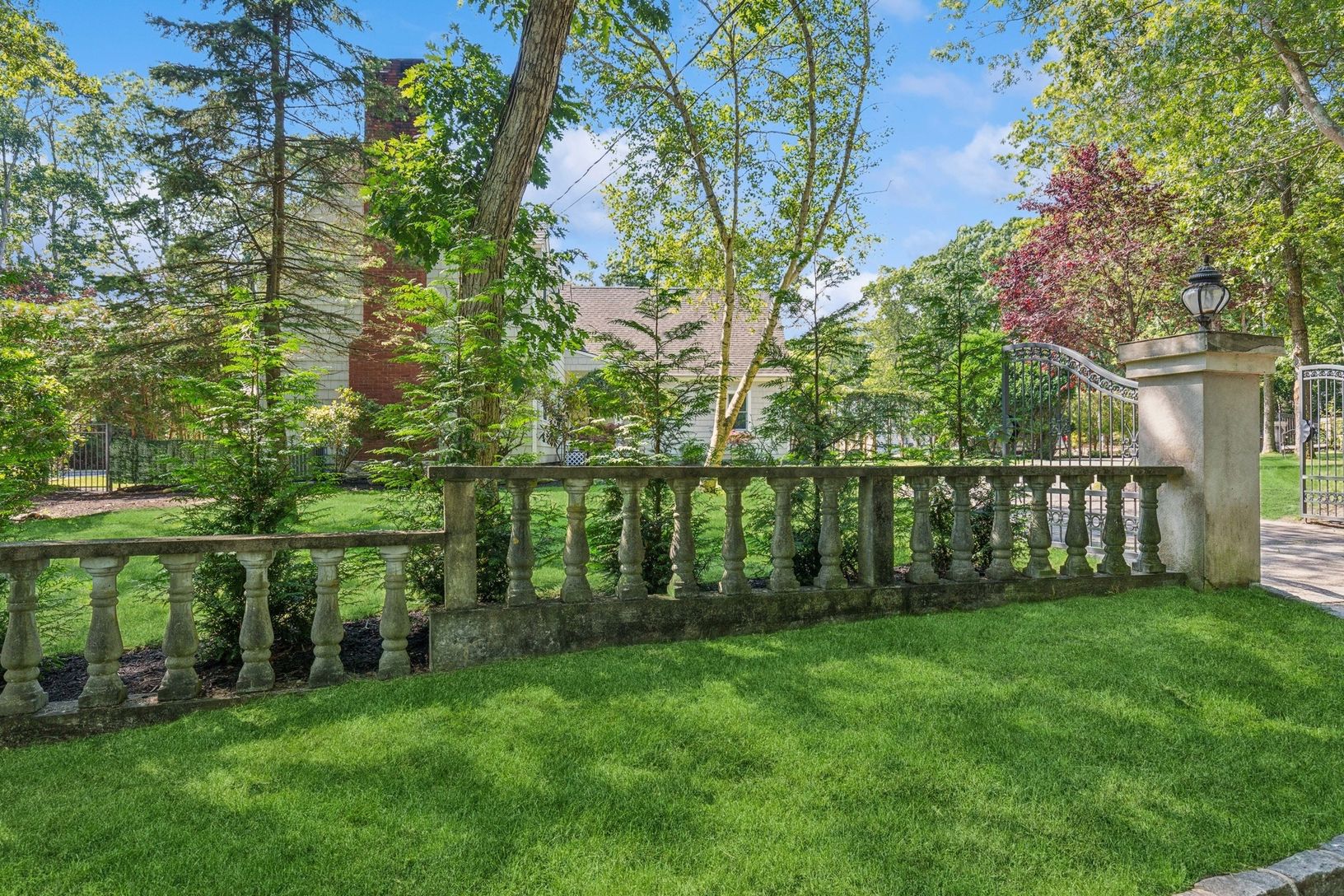 Front yard and trees with ornamental Balustrade Garden Wall