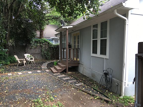 Front of this charming cottage, parking for 1 car